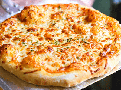 Freshly baked cheesy pizzas with a golden crust and rich melted toppings served at Mahony’s Steak House in Bishopbriggs, Bishopbriggs.